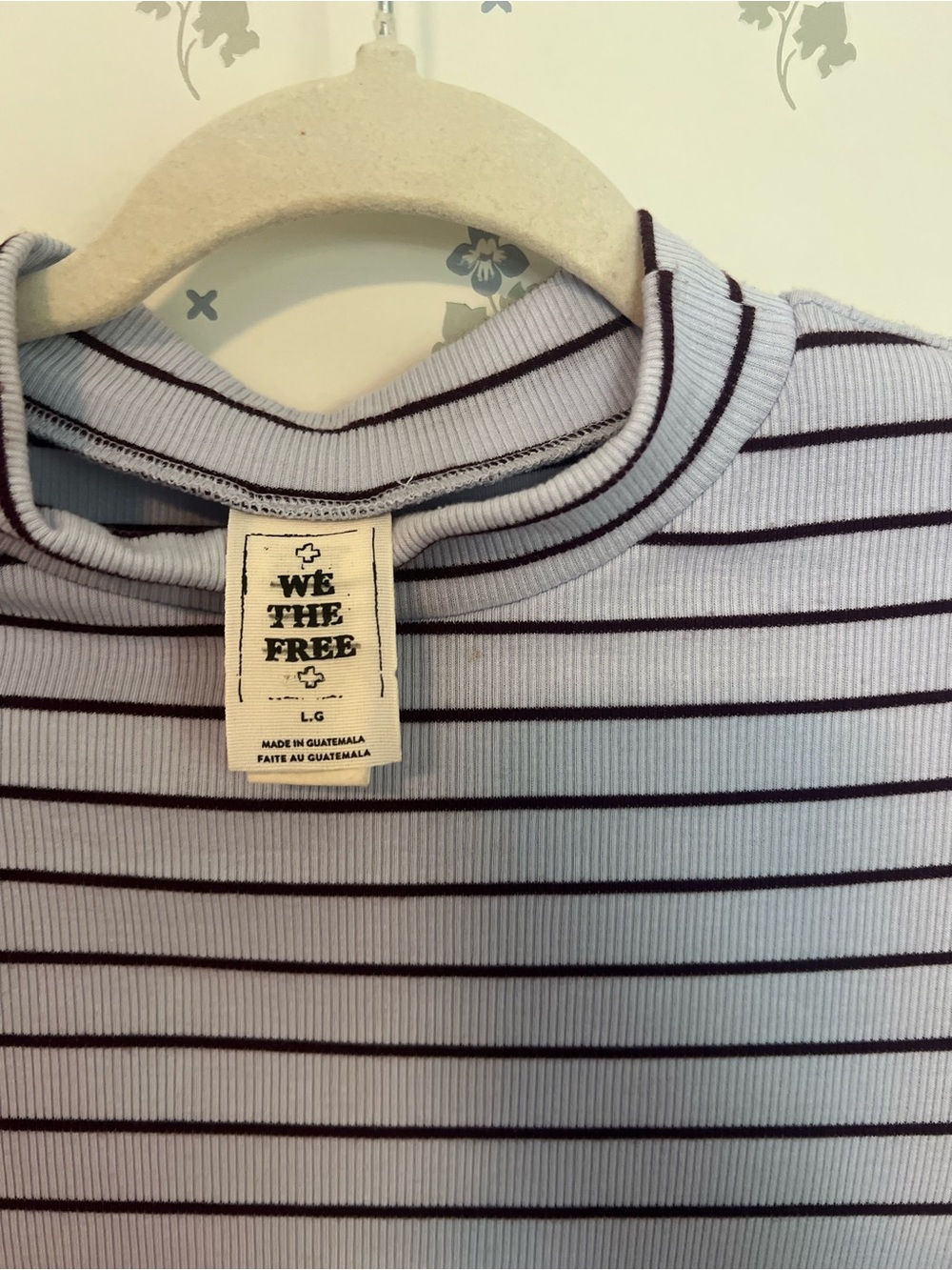 We The Free Short Sleeved, ripped, Mock Neck top.